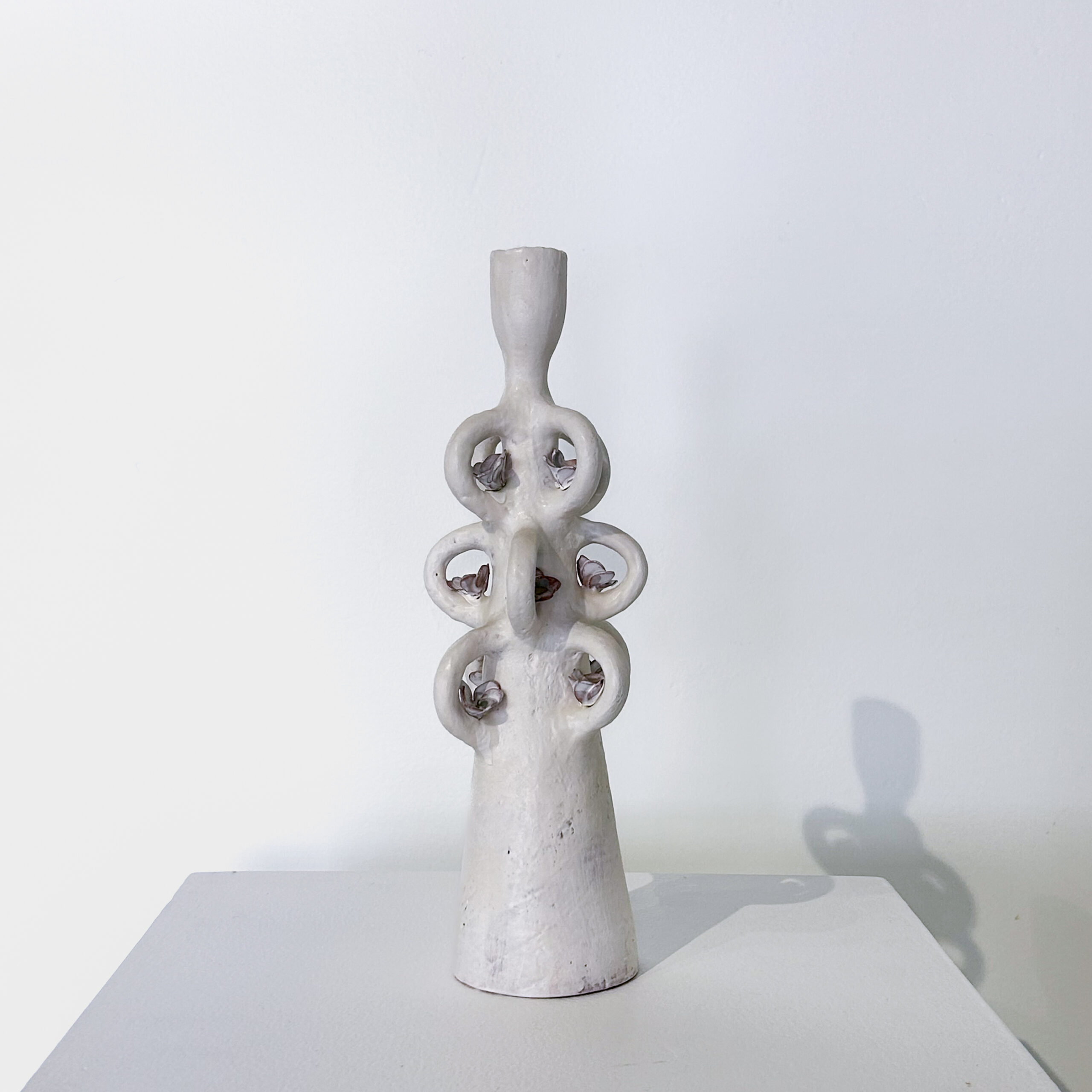 White candle loops and flowers